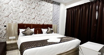 Jaguar Inn Room Type - Deluxe AC Room