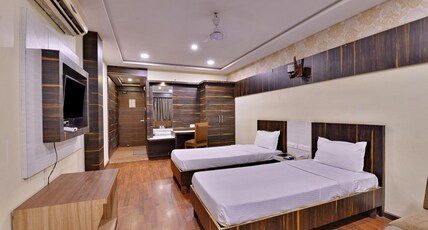 Hotel Puneet International Room Type - Super Deluxe Double Room