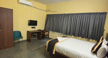 Hotel The Pride Room Type - Deluxe Room Ac