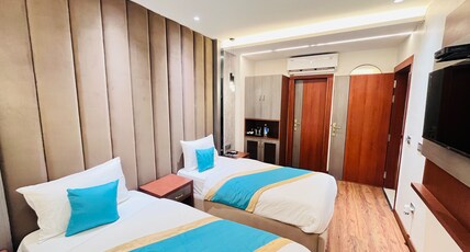 Kahani ( hotel & celebrations) Room Type - Deluxe Twin Bed Room