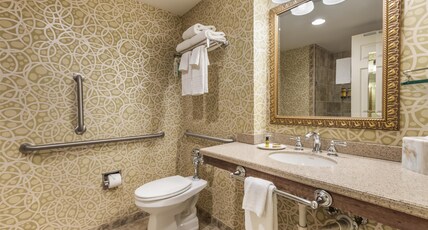 Best Western Plus The Normandy Inn & Suites Room Type - Suite-1 King Bed, Mobility Accessible, Communication Assistance, Roll In Shower, Sofabed, Non-Smokin Best Western Plus The Normandy Inn & Suites Room Type - Suite-1 King Bed, Mobility Accessible, Communication Assistance, Roll In Shower, Sofabed, Non-Smokin