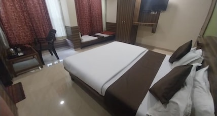 Hotel Laxmi GH Room Type - Standard Triple Bed Non AC Hotel Laxmi GH Room Type - Standard Triple Bed Non AC