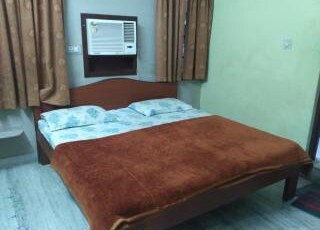 Kartikey Hotel Room Type - Deluxe Room A/C
