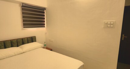 GREENS RESIDENCY Room Type - Non AC Bedroom