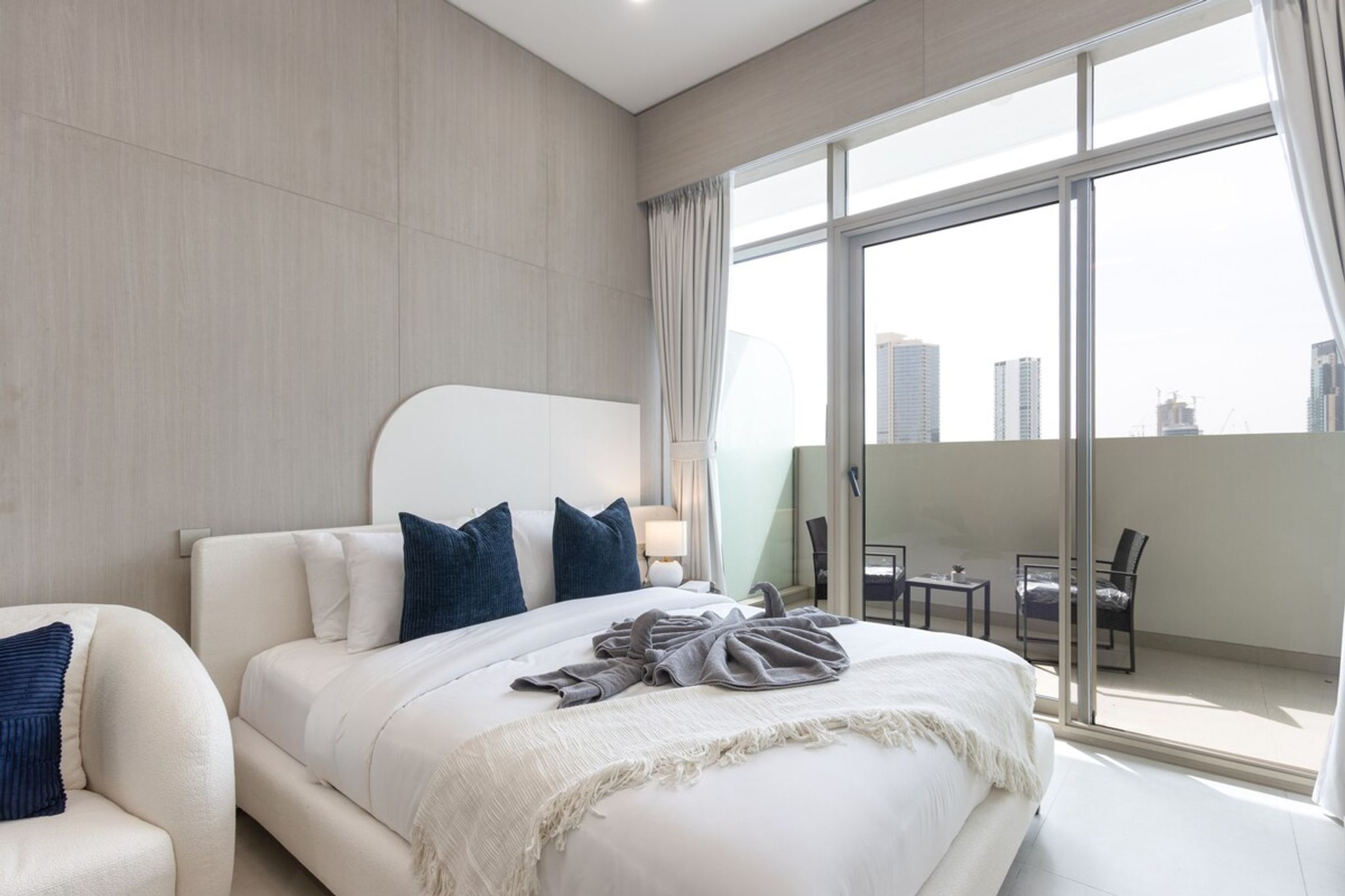 ELIVAAS Curated Elegant Designer Studio - Balcony | Rooftop Pool - Tap to explore photos