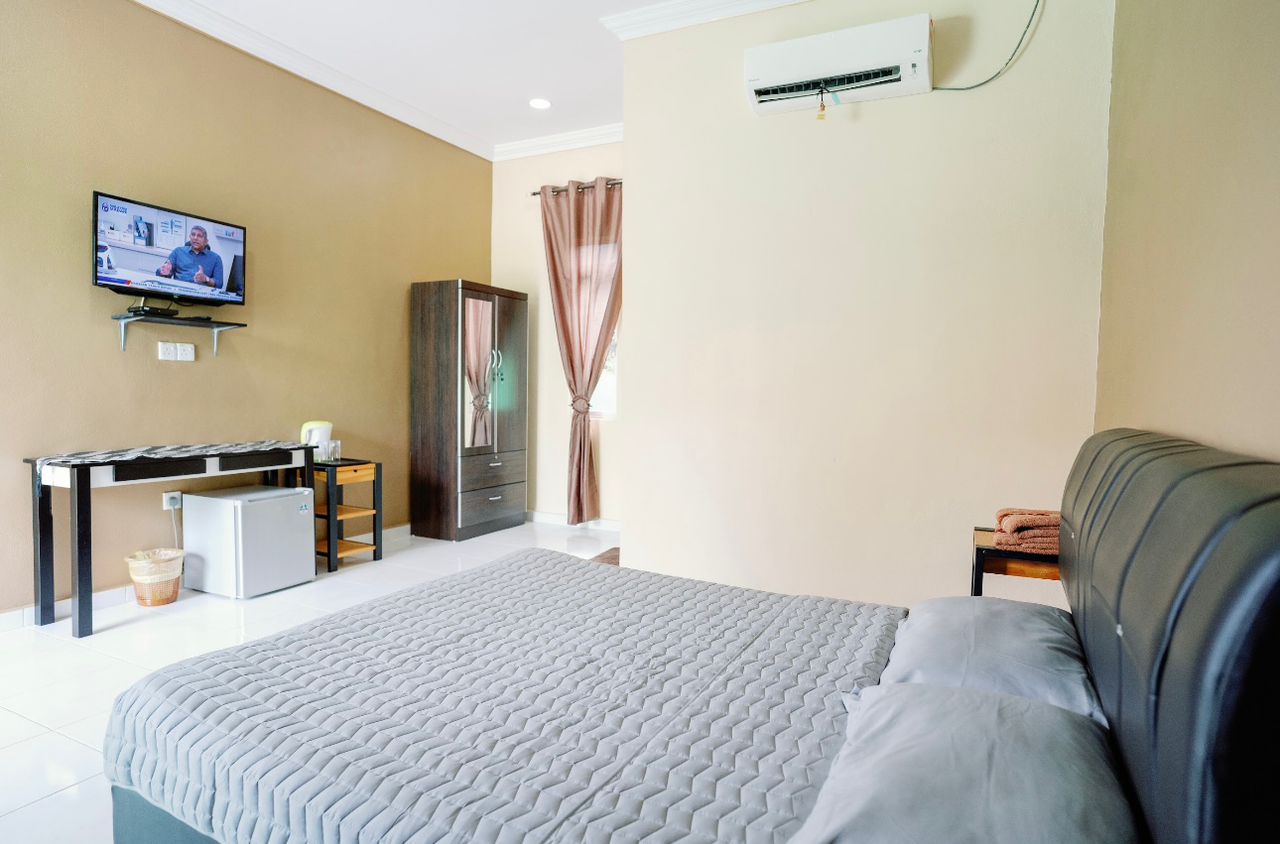 OYO 91271 Cik Ein Homestay - Tap to explore photos