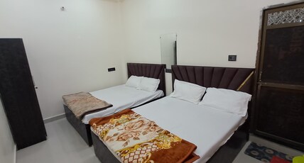 Aashvi Guest House | 10 min walk to Shri Ramjanmbhumi Room Type - Deluxe AC Room ( Max 4 Adults + 1 Child )
