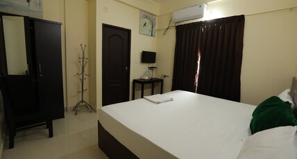 Classique Inn | Near Padmanabhaswamy Temple Room Type - 3 BHK Apartment AC