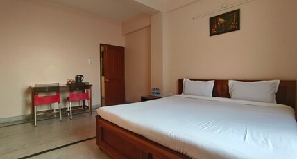 M J Towers || 5 Mins from Police Bazar Room Type - Deluxe Double Bed Room