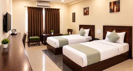 Hotel Shubham Grand || Near KIIT, DLF Cyber City & Infocity Room Type - Deluxe Twin Bed