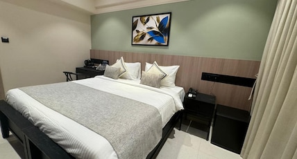 HOTEL MUMBAI HOUSE VALNAI MALAD. Room Type - Deluxe Room HOTEL MUMBAI HOUSE VALNAI MALAD. Room Type - Deluxe Room