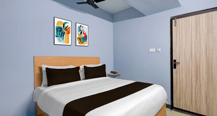 OYO Townhouse Punnami Riverview Formerly Vihaan Square Room Type - Classic
