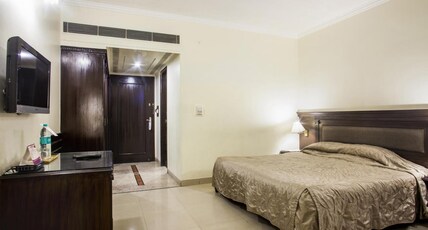 Hotel Om Tower & Revolving Restaurant Room Type - Deluxe Room