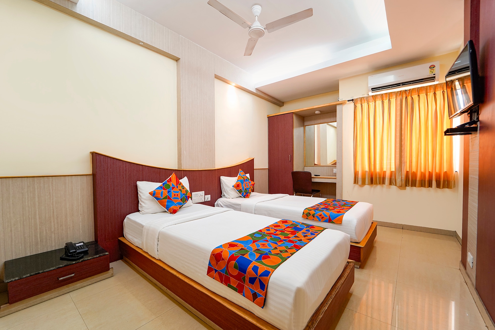 FabHotel Grand Gunas - Tap to explore photos