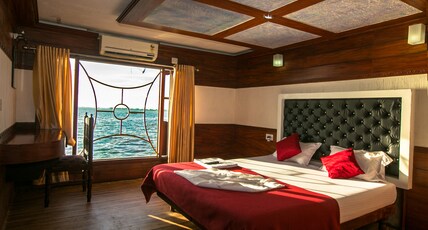 Symphony Houseboats Room Type - Deluxe Family Room-AC timing 9 PM to 6 AM (Sharing Houseboat) Veg Meals Only Symphony Houseboats Room Type - Deluxe Family Room-AC timing 9 PM to 6 AM (Sharing Houseboat) Veg Meals Only