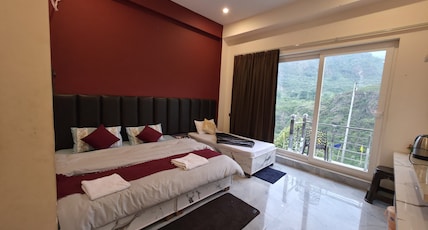 TRISHUL INN Room Type - Deluxe Triple Bed AC Room With Private Balcony TRISHUL INN Room Type - Deluxe Triple Bed AC Room With Private Balcony