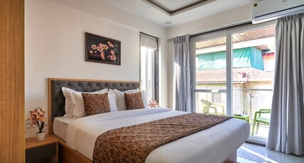 Drizzle Resort With Swimming Pool Near Mapro Garden Room Type - King Room with Balcony