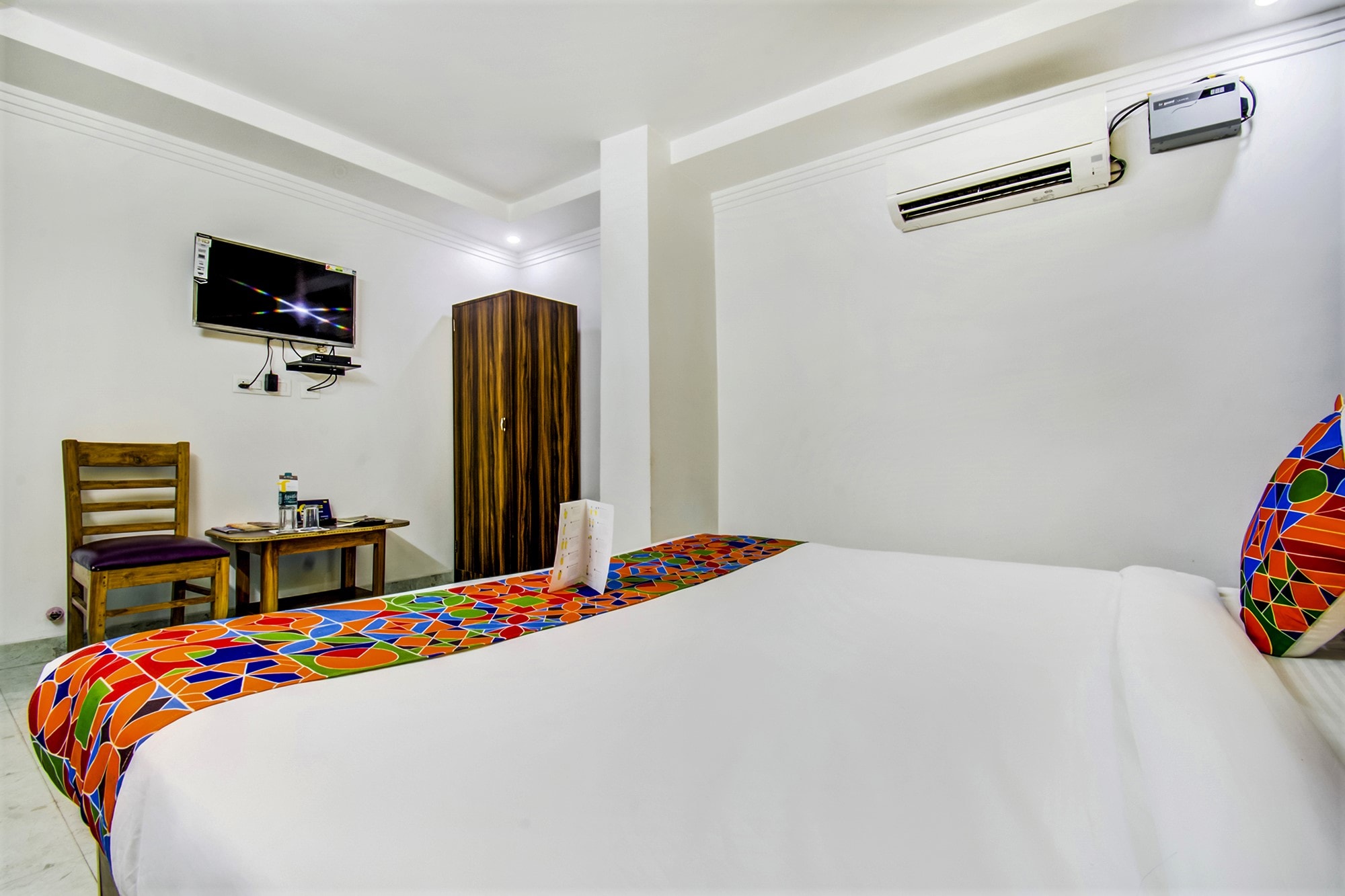 FabHotel Grand Sheela - Tap to explore photos