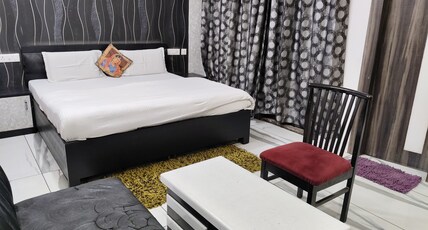 Hotel Sai Orchid Room Type - Deluxe room