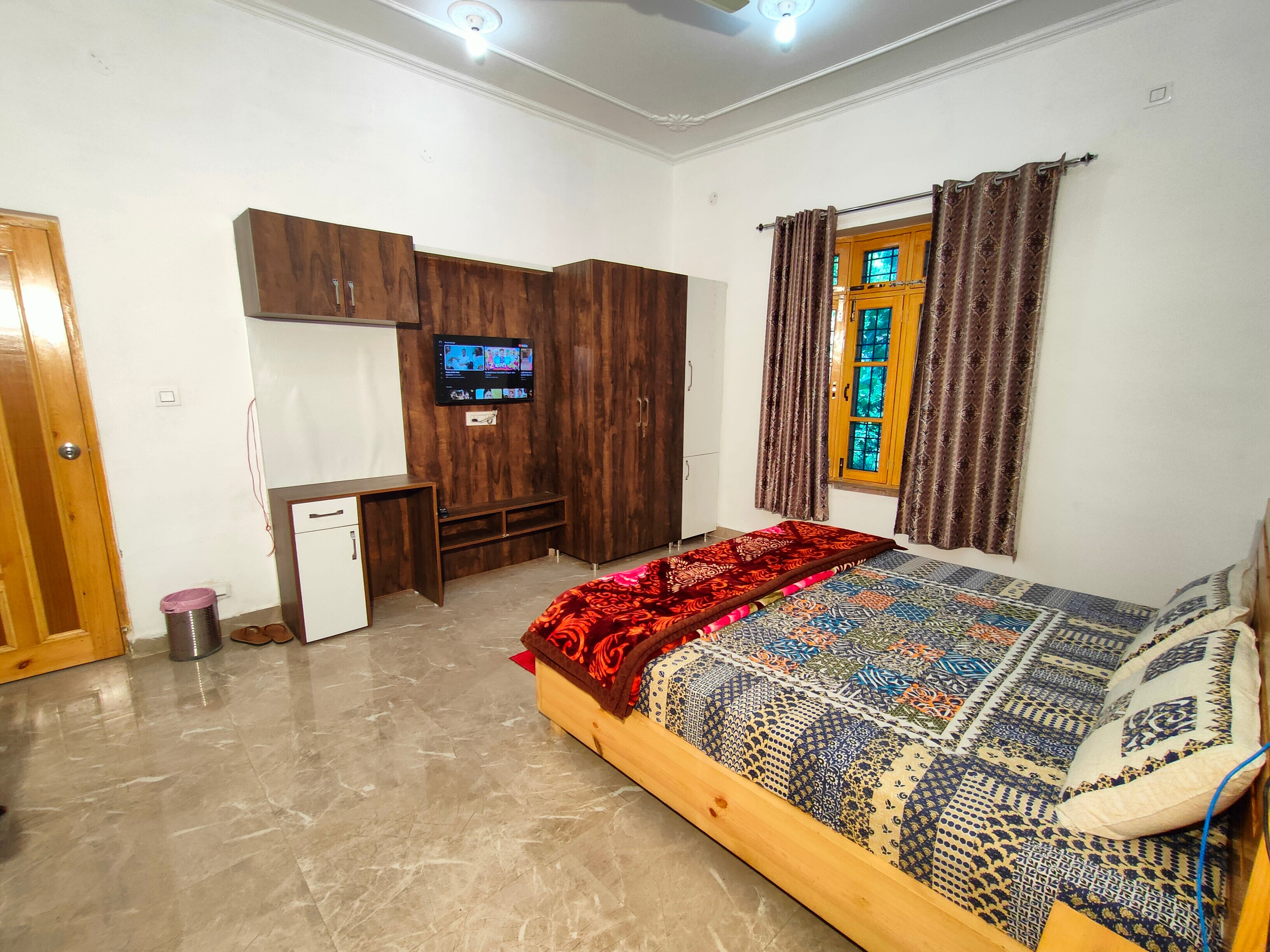 Travelodge Homestay - Tap to explore photos