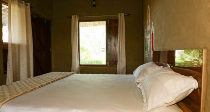 Mud Haven Farmstay Room Type - Cottage Champa