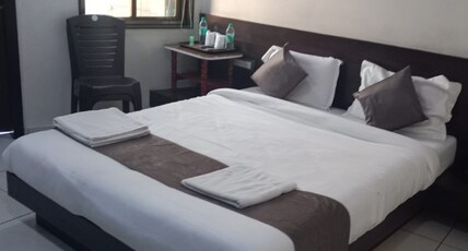 HOTEL SHREENATHJI Room Type - Deluxe Two Bed Room
