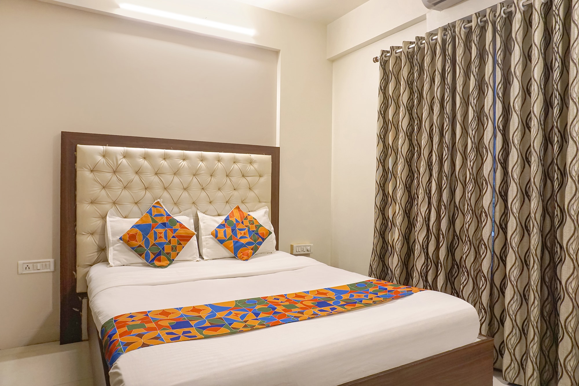 FabHotel Executive Pearl Inn - Nr. Twin Tower - Tap to explore photos