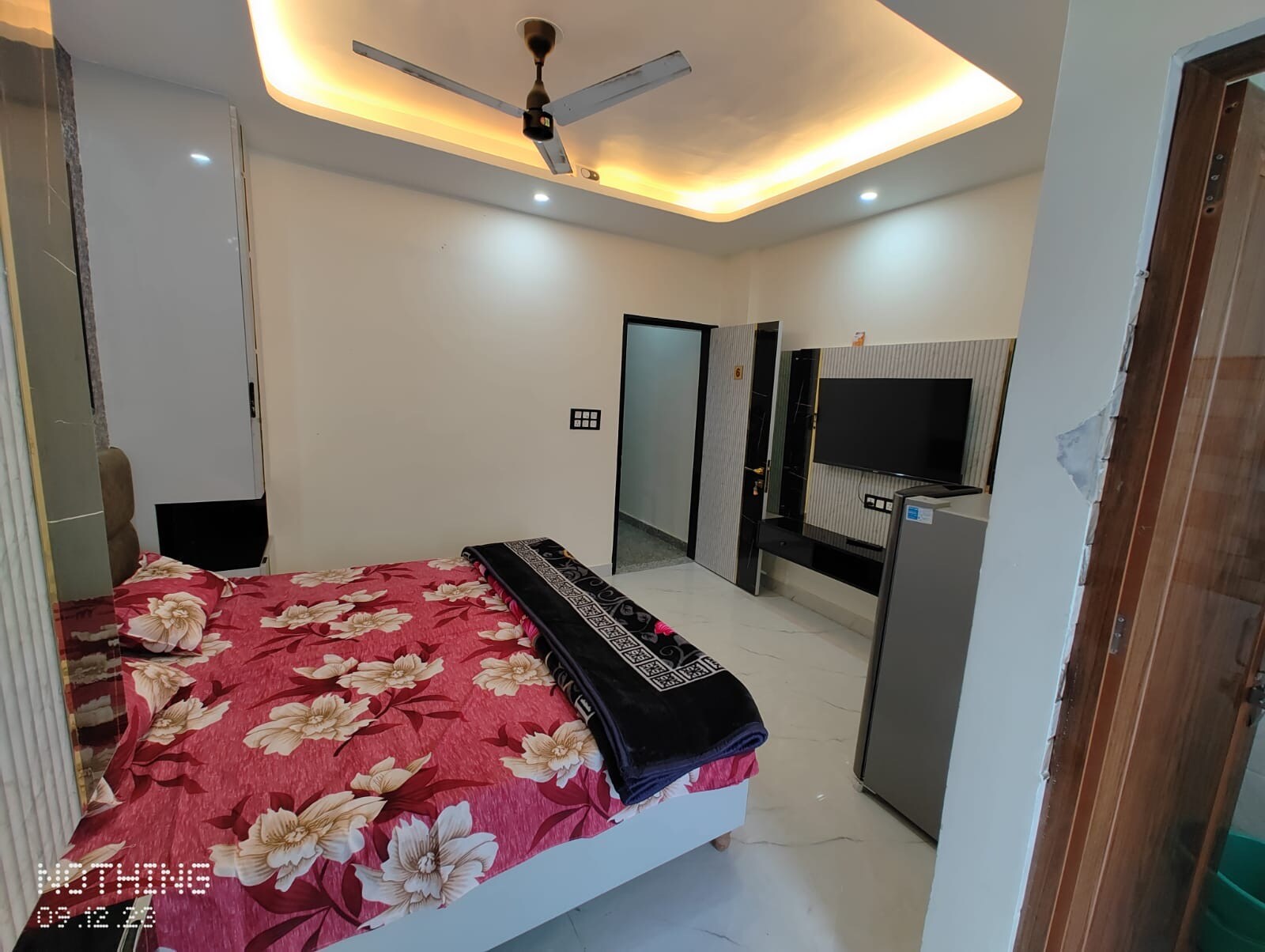 Neat and clean room in a secured building - Tap to explore photos