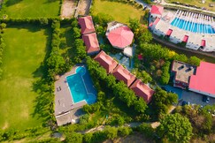 The Corbett Manral Resort (1.6km from Kosi River)