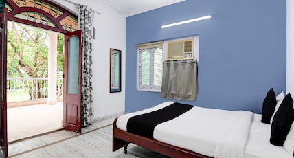 Smart Stay by Brill Rooms Near Karunamayee Room Type - Deluxe Room with Balcony Smart Stay by Brill Rooms Near Karunamayee Room Type - Deluxe Room with Balcony