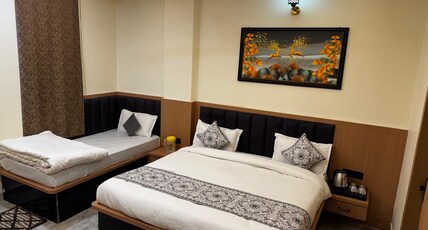 Hotel Shri Radhavan Room Type - Super Deluxe Triple Bed Room