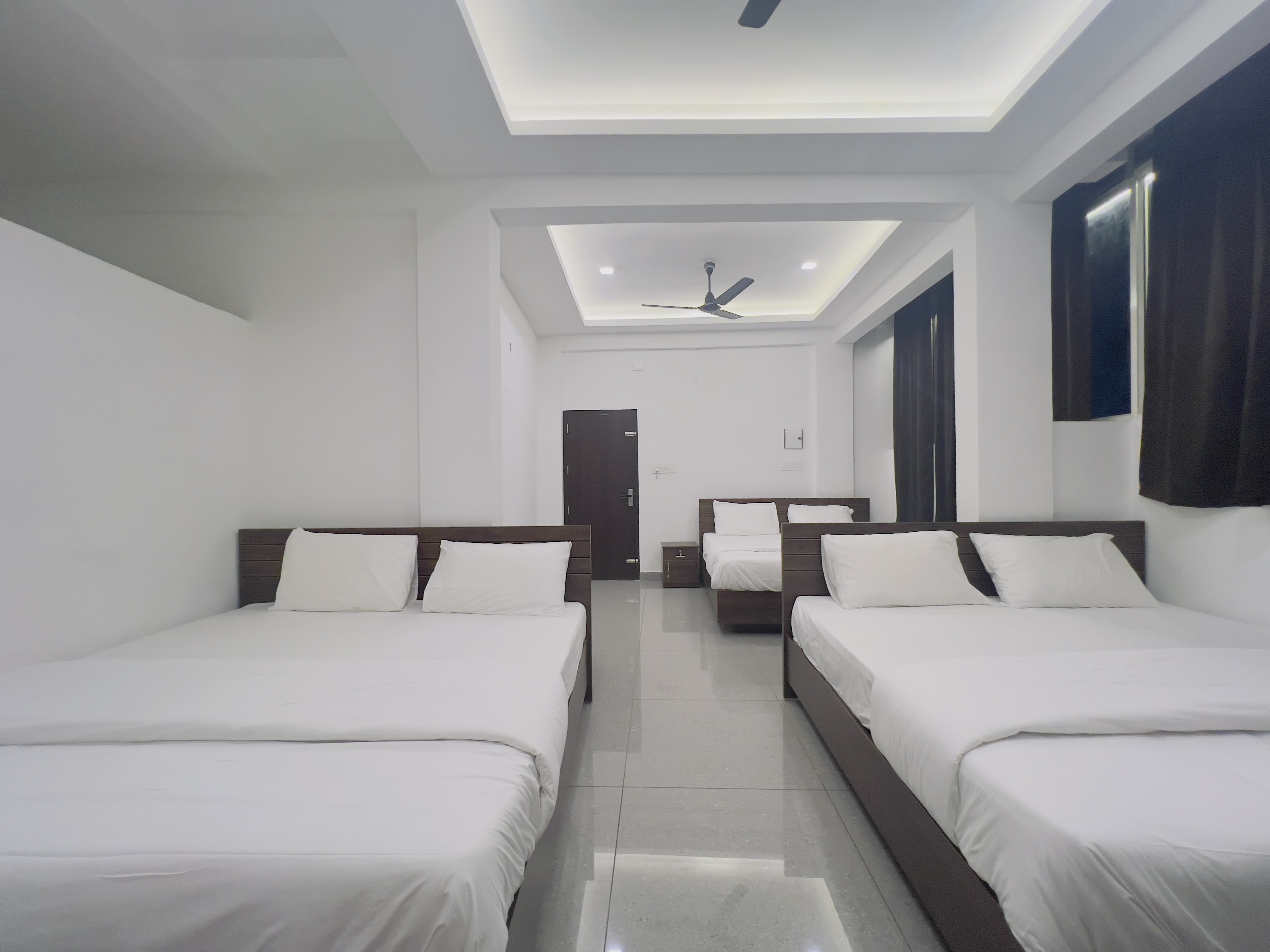 AROMA INN Room Type - 3 BED DELUXE FAMILY AC ROOM