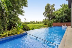 tisyastays | D'Retreat 1BHK Apartment with Infinity Pool, 5mins to beach