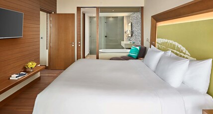 NOVOTEL DANANG PREMIER HAN RIVER Room Type - 2-Bedrooms Apartment, balcony, living room, kitchens, bathtub, 01 king bed and 2 single beds NOVOTEL DANANG PREMIER HAN RIVER Room Type - 2-Bedrooms Apartment, balcony, living room, kitchens, bathtub, 01 king bed and 2 single beds