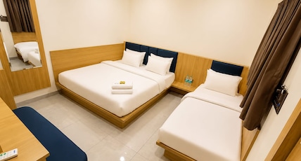 Hotel Agrawal Inn Room Type - Triple Bedroom Hotel Agrawal Inn Room Type - Triple Bedroom