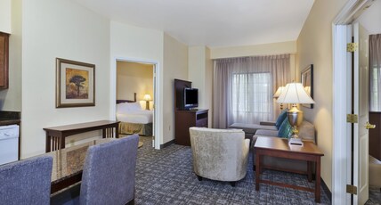 Staybridge Suites LANSING-OKEMOS, an IHG hotel Room Type - 1 King 2 Queen 2 Bedroom Suite Sofa Bed Staybridge Suites LANSING-OKEMOS, an IHG hotel Room Type - 1 King 2 Queen 2 Bedroom Suite Sofa Bed