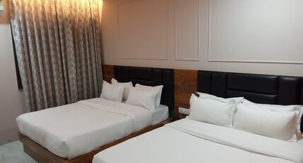 Hotel Samrat Room Type - DELUXE 4 BED AC ROOM