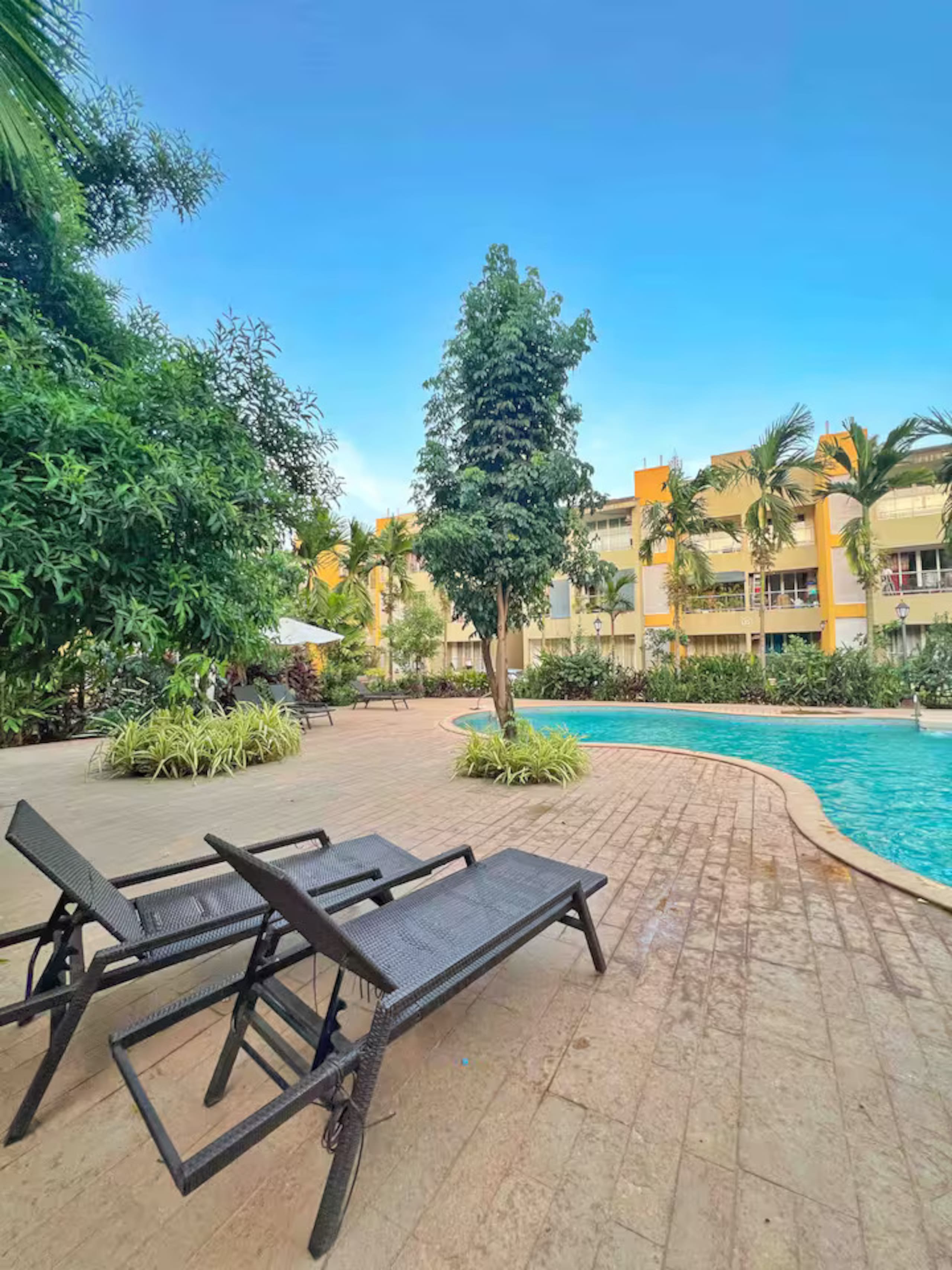 1BHK Room Common Pool Charvi - Tap to explore photos