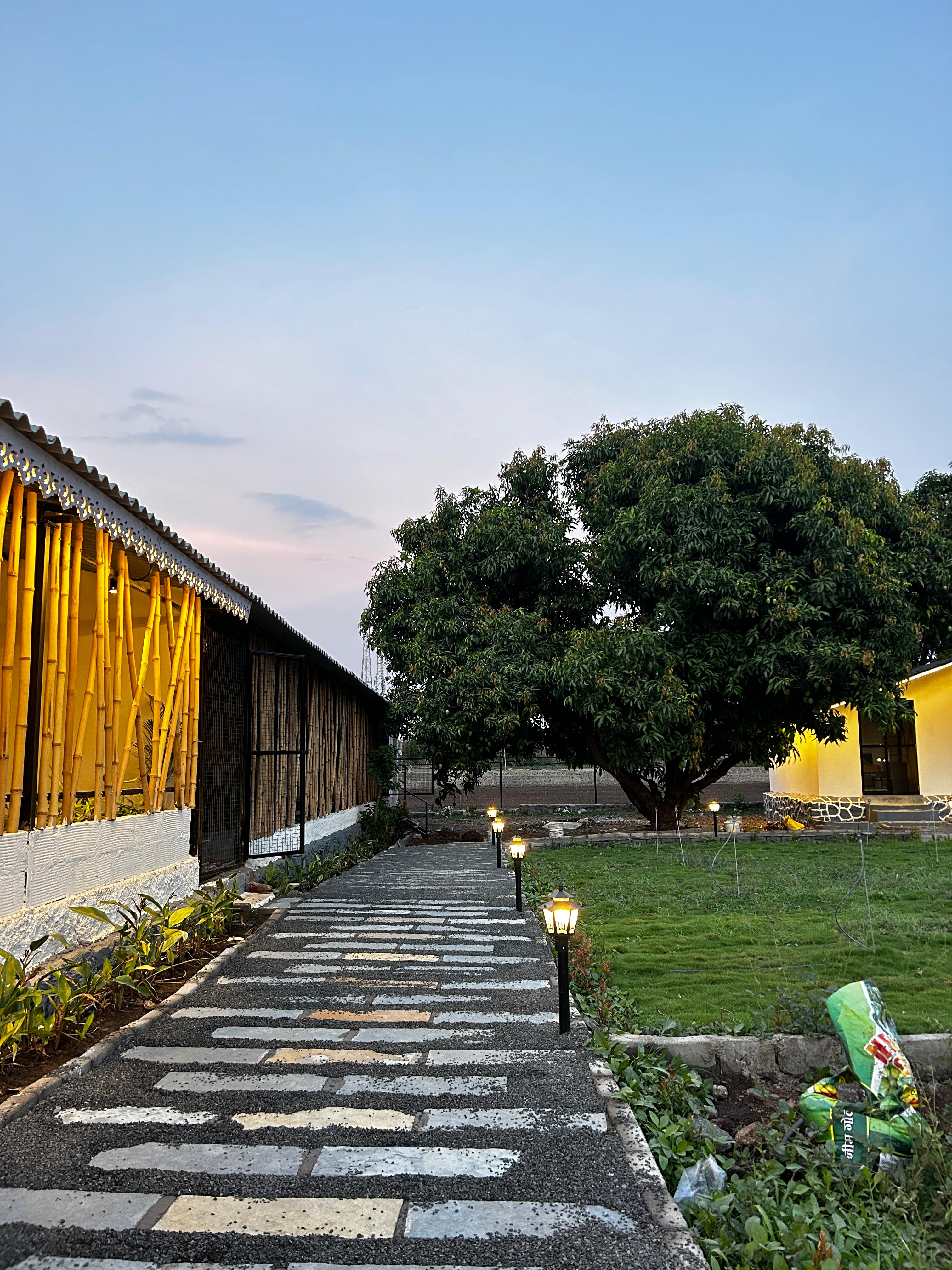 The Mango Orchard Resort - Tap to explore photos
