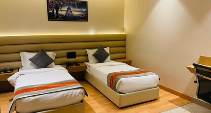 Arihant Hotel and Restaurant Room Type - Deluxe Room