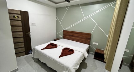 Hotel New Holiday Inn. Room Type - Deluxe Non AC Room