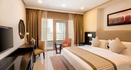 Ramada Hotel and Suites Amwaj Islands Room Type - 2 King Beds and 1 Twin Bed, Premium Two-Bedroom Apartment, Non-Smoking Ramada Hotel and Suites Amwaj Islands Room Type - 2 King Beds and 1 Twin Bed, Premium Two-Bedroom Apartment, Non-Smoking