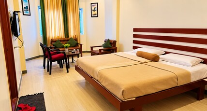 Hotel Dhanashree Room Type - Deluxe Room Ac