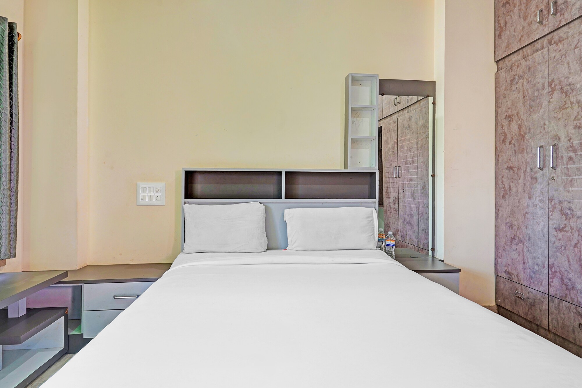 FabHotel Shrinidhi Comfort - Tap to explore photos