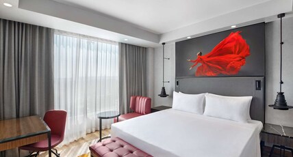 Radisson RED Chandigarh Mohali Room Type - Junior Suite with King Bed and Living Room