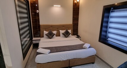 GREENLAND COTTAGES Room Type - Deluxe Room