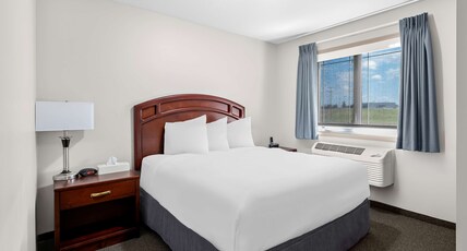 SureStay Plus Hotel by Best Western Hardisty Room Type - Suite-1 Queen Bed, Non-Smoking, One Bedroom, Flat Screen Television, Full Kitchen, High Speed Intern SureStay Plus Hotel by Best Western Hardisty Room Type - Suite-1 Queen Bed, Non-Smoking, One Bedroom, Flat Screen Television, Full Kitchen, High Speed Intern