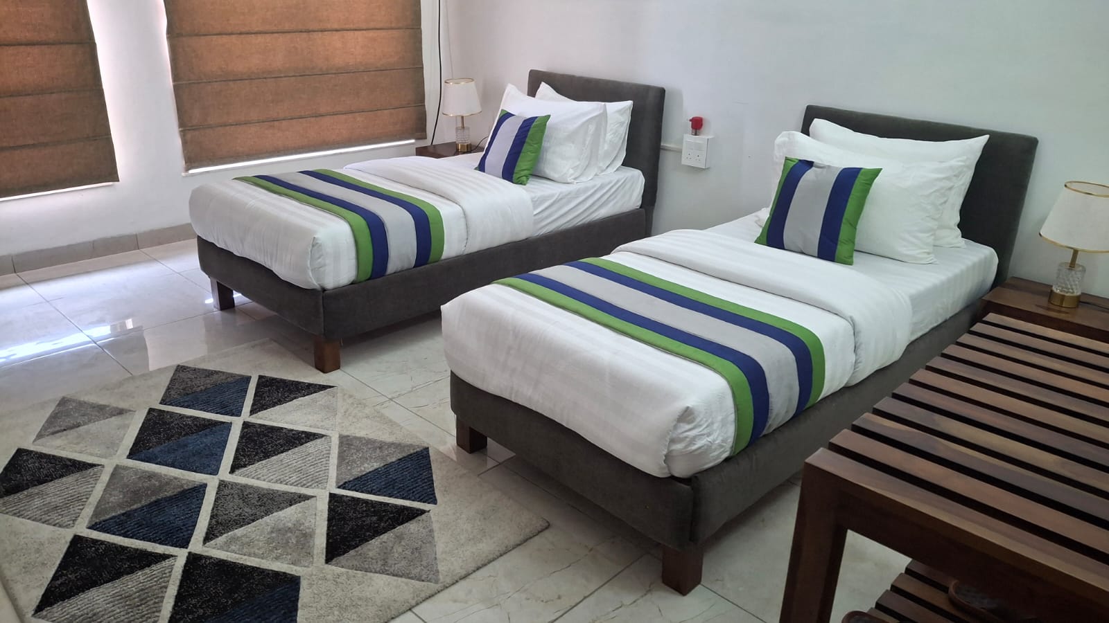TVS Credit Guest House Gurgaon - THE HIBISCUS - Tap to explore photos