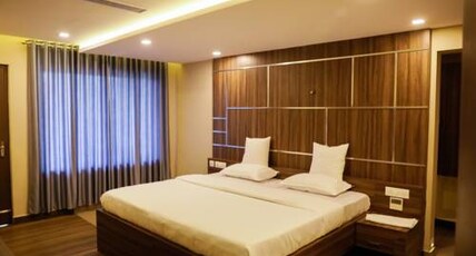 Hotel UC Plaza Room Type - PREMIUM  AC ROOM WITH BALCONY