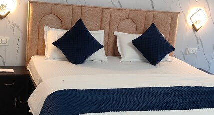 Yellow Divine Stay Near Baglamukhi Room Type - AC Comfort Room(102)